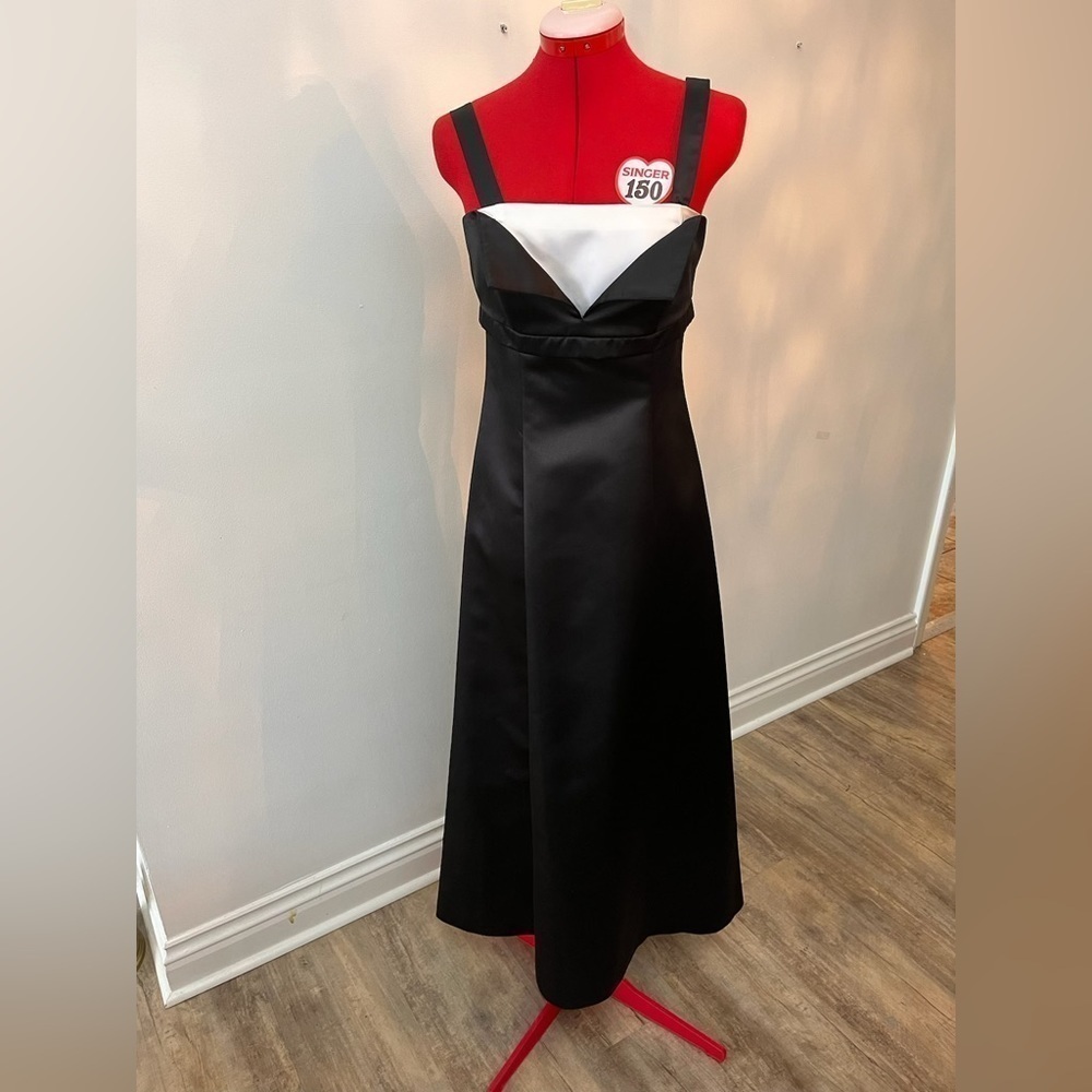Melanie Lyne Tuxedo Dress With Peekaboo White Shirt.